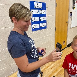 April Morse, Affective Needs Teacher at Academy Endeavour Elementary plays with students during gym class